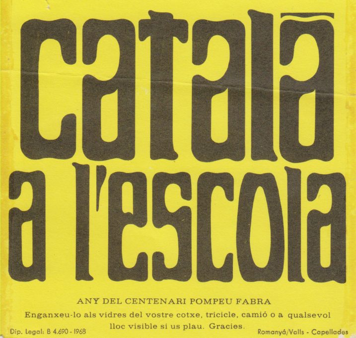 Cartell on es llig «Català a l'escola»